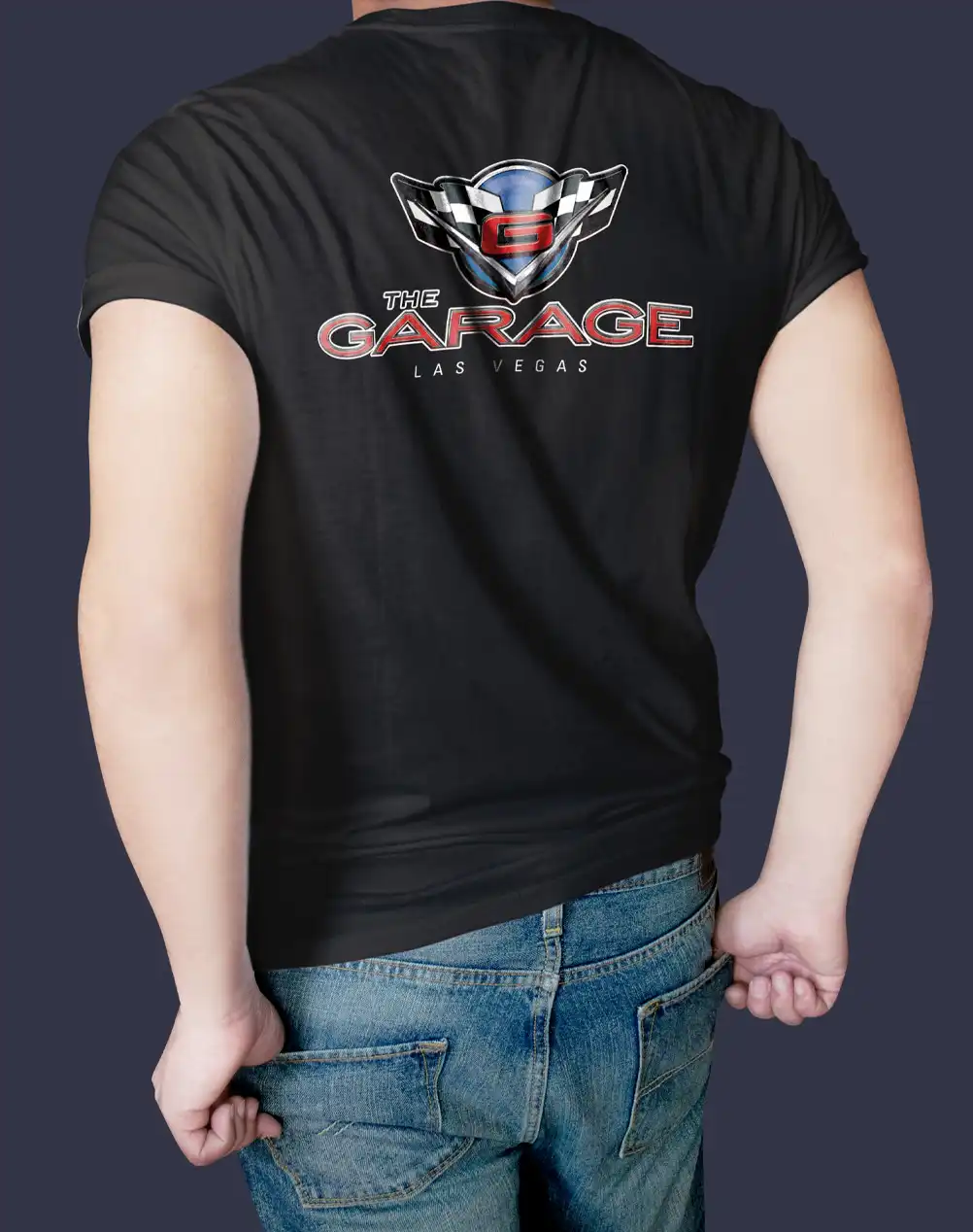 Handsome guy modeling the back of a T-shirt with The Garage Las Vegas logo