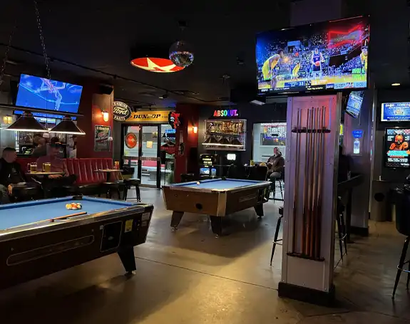 The Garage indoor seating, darts, pool and shuffleboard